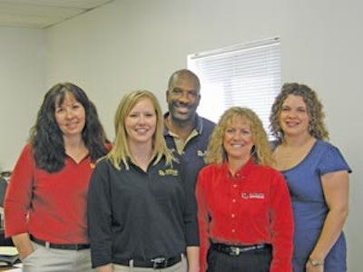 Maurice Dowell with (left to right) account manager Jane Door, account manager/landscape designer Jennifer Kleechulte, Donna Dowell, and production manager Jessica Harmon.
