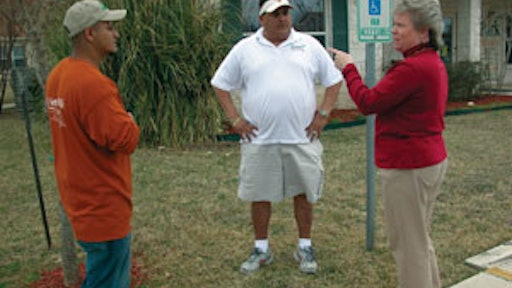 Loyal customers such as Rick Dean of Creston Ridge and Pam O'Banion of Alpha Barnes (pictured) have helped Certified Lawn & Landscape kick-start sales growth. At right is Jon Zertuche, with son-in-law Jon Oyervides on the left.