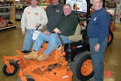 From left: Rich Crane Jr., Todd MacNeil, Don Segalla (seated), Rich Crane Sr.