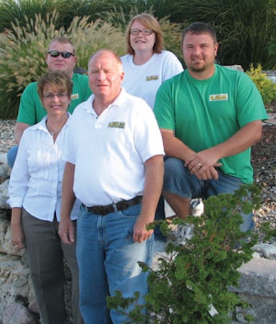 In front are owners Terry Dinkelman Sr. and wife Sheila. In back (left to right) are children Terry Dinkelman Jr., Mary Huston and Shawn Watts.