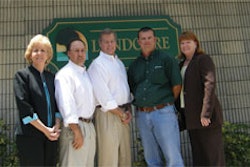 The Landcare team (left to right): Office manager Linda Yochim; V.P. of sales, marketing and client relations Jerry Roque; company president K.C. Fisher; general manager Richard Ellis; and chief financial officer Debra Morgan. Missing is administrative assistant Kelley Sadlowski.