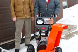 Dan Ariens (left) personally delivers snowthrower
