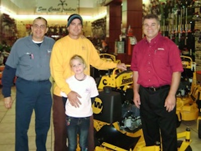 (L to R) John Biesterfeld, CEO of Green Thumb Lawn & Garden Center; Wright sweepstakes winner David Croyle, DKC Services, with his daughter, Kaylee Croyle; and PACE Territory Manager John Franke.