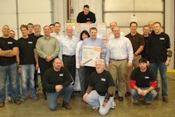 Group of Bryan Equipment Sales employees with the 5 millionth unit sold.