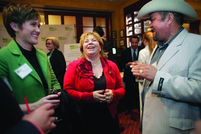 Jesus “Chuy” Medrano, NHLA president and co-owner of Colorado-based CoCal Landscape, visits with Congresswoman Linda Sanchez (D-CA, middle) at the NHLA’s inaugural reception in Washington, D.C.