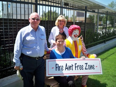 Victor Markle of Markle Pest Management & Tree Service; Corinne Karp, COO of the Ronald McDonald House of Dallas; and Judy Wanner of FMC Professional Solutions join forces to fight fire ants at the Ronald McDonald House of Dallas.