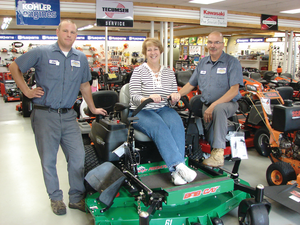 Jim Jr. (who manages the commercial accounts and demos) stands alongside Sharon and Jim Preuss.