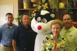 From left: Mark Pugh, Tim Pugh, Pughy the mascot, Arminta Pugh, Michael Pugh
