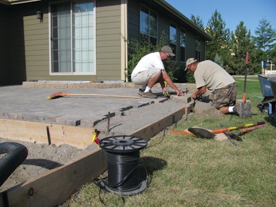 Homeowners aren't putting in hardscapes because they want to get rid of grass. They simply have the room and want to extend their homes.