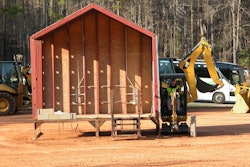The smallest model in the E Series of excavators has adjustable-width tracks, and can fit through gates to easily access backyards.