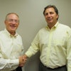 Bill Vogel (L), CEO of Spring Valley and Craig Reinders, president of Reinders Inc., finalize their new partnership.