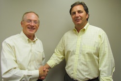 Bill Vogel (L), CEO of Spring Valley and Craig Reinders, president of Reinders Inc., finalize their new partnership.