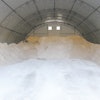 A fabric structure provides a better solution because the salt pile remains completely out of the elements. Due to the height of the structures, equipment can enter and maneuver completely under cover.