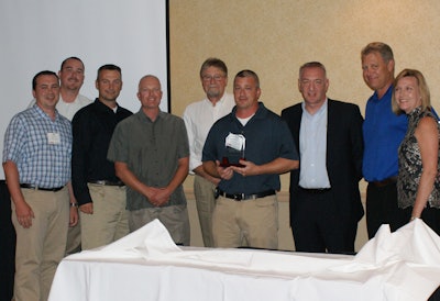 Left to right: Jon Richardson (Finn), Matt Jacobs (Highway Equip), Nate Brooms (Highway Equip), Jim Langer (Highway Equip), Don Sharp (Finn-retired), John McNally (Highway Equip), James Higgins (Finn), John Imm (Finn), and Angie Arnold (Finn).