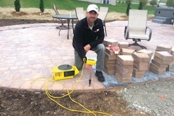 Contractor Chad Beidel with his prized zip level.