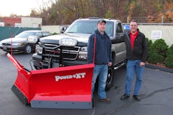 Connor Hedge (left) was awarded a Boss Power-V XT Plow from dealer Kenneth Cashman of Ken's Auto Sales.