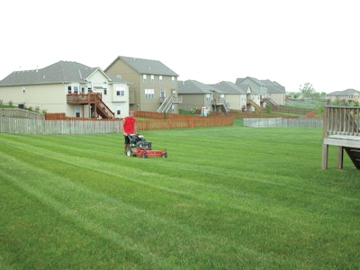 Here's another 'hidden inefficiency' in a landscape company: using the wrong mower for the application at hand. Wouldn't a faster, more comfortable zero-turn rider with a larger deck be better-suited here?