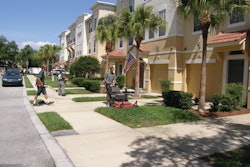 A commercial lawn maintenance crew in Florida. Multi-family housing construction is growing quickly, creating opportunity for landscape contractors.