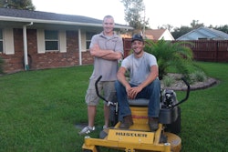 James Gardner (standing) with employee Jason Phillips