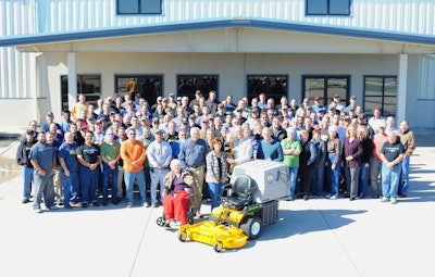The milestone was celebrated with lunch and a company photo of Walker's 155 employees.