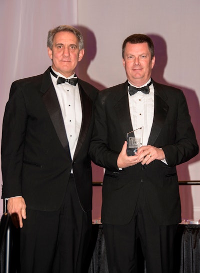 Parke Kallenberg, vice president of training (left) and Mark Lenahan, director of training & development, accept the Training Magazine award for ValleyCrest Landscape Companies at a reception hosted by the magazine.