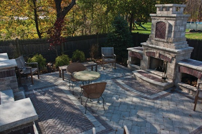 The rise of the outdoor chef has led to a surge in demand for outdoor kitchens. Photo courtesy of Landscape America in Wrentham, MA.