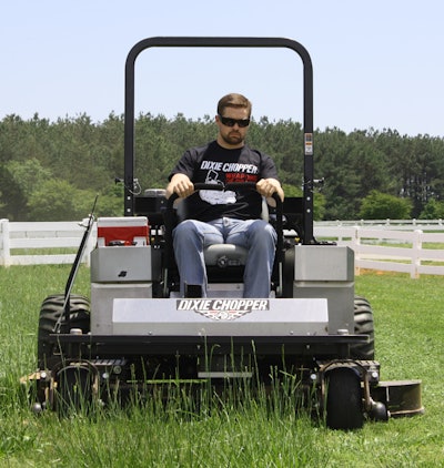 NASCAR driver Ricky Stenhouse Jr. on his Dixie Chopper.