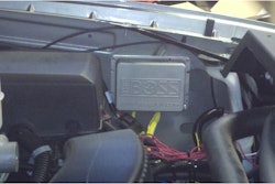 Mounted under the hood of the truck, the Vehicle Control Module (VCM) receives commands from hand control and sends them wirelessly to the PCM and senses whether the plow is connected, and powers either plow headlights or vehicle lights.