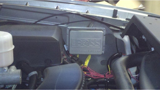 Mounted under the hood of the truck, the Vehicle Control Module (VCM) receives commands from hand control and sends them wirelessly to the PCM and senses whether the plow is connected, and powers either plow headlights or vehicle lights.