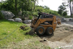 Case skid-steer loader - bucket excavating