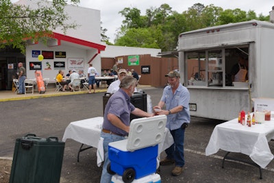 More than 150 customers enjoyed the March cookout. The total cost of the event was approximately $1,500 and it brought in $90,000 in equipment sales.