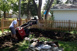 A Toro Dingo mini-loader was used to help build a backyard patio and fire pit.