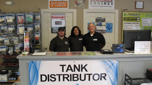 Owner Frankie Morales (right), secretary Martha Vazquez with associate Doug Jones.