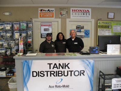 Owner Frankie Morales (right), secretary Martha Vazquez with associate Doug Jones.