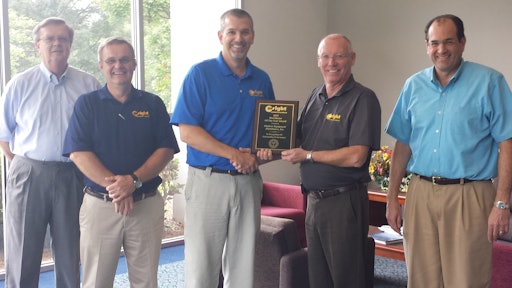 Participating in the Distributor of the Year award presentation are (l to r) Ray Clark, OED vice president of administration; Jim Fenner, OED sales manager; Rob Zucker, OED president; Hal White, Wright vice president of sales; and David Zucker, OED vice president of finance.
