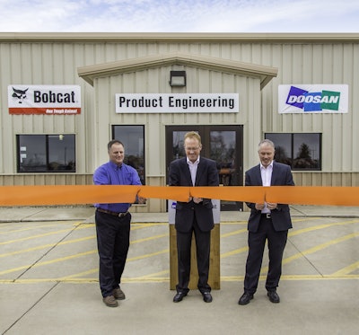 Rich Goldsbury, president of Bobcat and Doosan North America and Oceania (middle) was recently joined by Gwinner Mayor Dan McKeever (left) and members of the Gwinner City Council for a ribbon cutting ceremony at the Gwinner engineering facility. The renovation project is part of an ongoing investment to help enhance work environments, accommodate growth , drive innovation and improve operations across the organization.