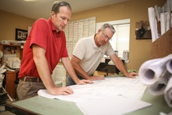 Michael Hatcher (right) with Jeff Peterman, landscape construction manager