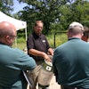 Dealer Mike Halloran talks propane cylinders with interested attendees at the August 2016 Chicago Area Clean Cities Coalition event.