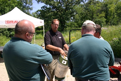 Dealer Mike Halloran talks propane cylinders with interested attendees at the August 2016 Chicago Area Clean Cities Coalition event.