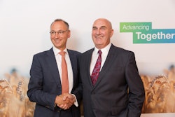 Werner Baumann (left), CEO of Bayer AG, and Hugh Grant, Chairman and Chief Executive Officer of Monsanto.