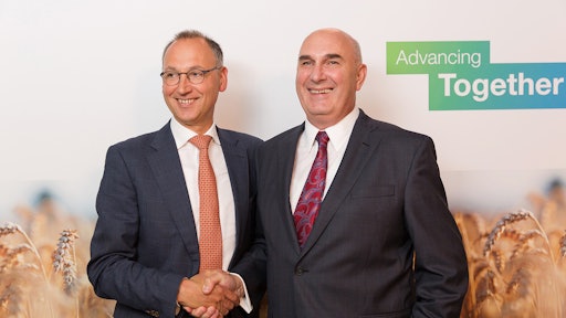 Werner Baumann (left), CEO of Bayer AG, and Hugh Grant, Chairman and Chief Executive Officer of Monsanto.