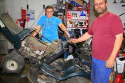Joe Roske with son, Nick. 'He is my right-hand man in the shop when he is not busy with school, soccer, band, or mowing yards with his older brother, Derek,' Joe tells.
