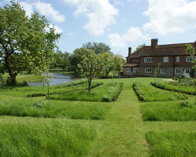 Grass Guide 4: Nigel Philips, original photo on Houzz Wide grass paths are mowed in a grid through taller grass plots to create a more formal look without cutting down the entire lawn.
