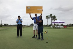 Arjun Mirdha, JCB North America President & CEO, and Tony Whitehurst, General Manager of JCB Finance, present Tammy Mixon, Executive Director of Wesley Community Centers, with a check for $90,000.