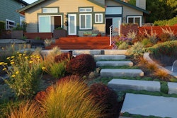 Dig Your Garden Landscape Design, original photo on Houzz. The owner of this California backyard got rid of the lawn and a dilapidated deck last spring in favor of low-maintenance pollinator-attracting perennials and grasses, new outdoor seating areas and a revamped deck.