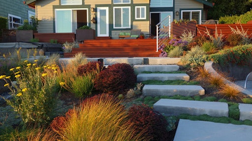 Dig Your Garden Landscape Design, original photo on Houzz. The owner of this California backyard got rid of the lawn and a dilapidated deck last spring in favor of low-maintenance pollinator-attracting perennials and grasses, new outdoor seating areas and a revamped deck.