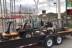 Reliable Lawn Care's t railer makes room for a Grasshopper diesel mower, a Cub Cadet zero turn mower and a Toro 30-inch walk behind.