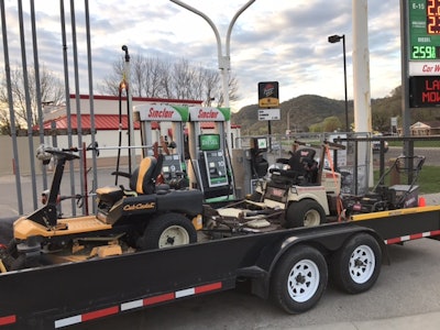 Reliable Lawn Care's t railer makes room for a Grasshopper diesel mower, a Cub Cadet zero turn mower and a Toro 30-inch walk behind.