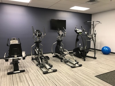 The renovated facility not only includes a workout room, but also showers and lockers for employees' use.