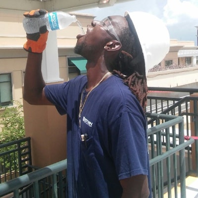 Western Worker Staying Hydrated in Heat 596e7ab511d95 59809f1611afd